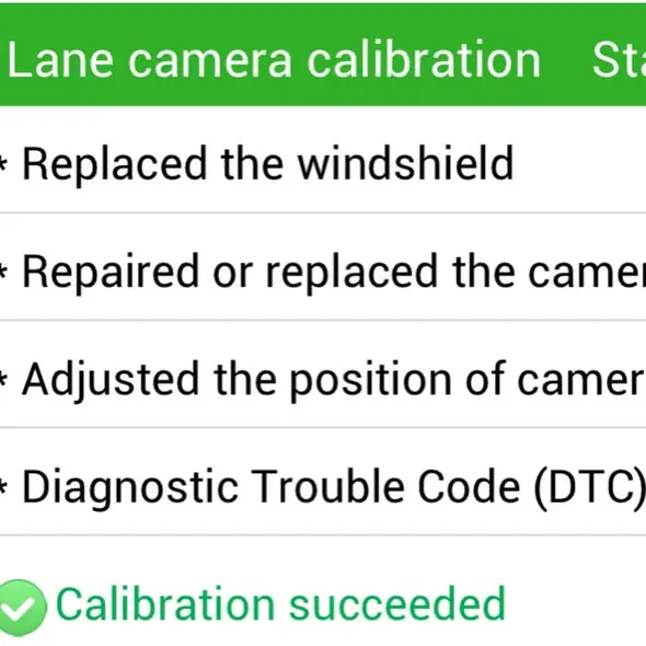 Scan tool screen reading 'Lane camera calibration – Calibration succeeded' after a windshield replacement